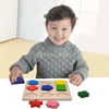 one boy with shape puzzles