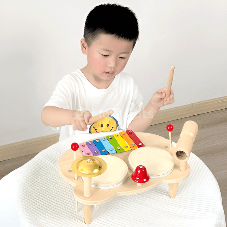 one boy playing wooden drums set