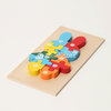 one wood puzzle on the board